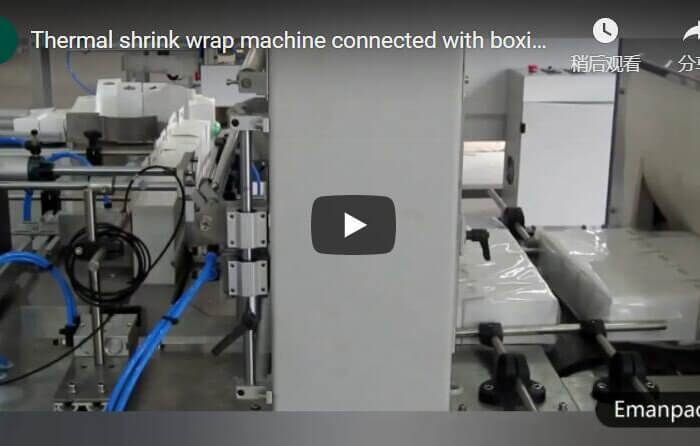 Sleeve sealing shrink wrapping machine for packing LED bulb boxes