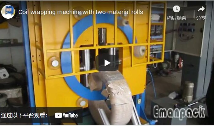 Coil wrapping machine with two material rolls