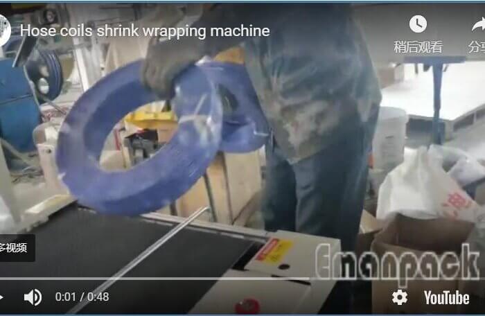 Hose coils shrink wrapping machine