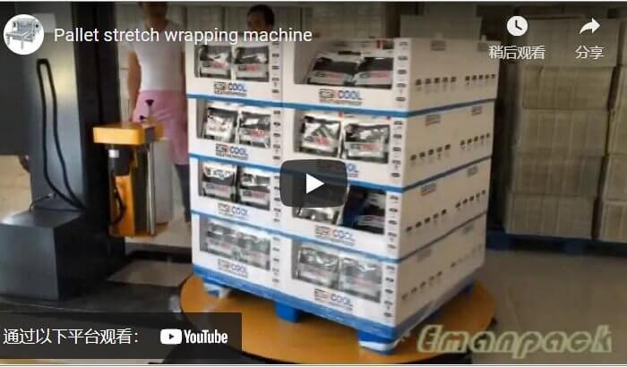 Pallet stretch wrapping machine packing loads of toy boxes