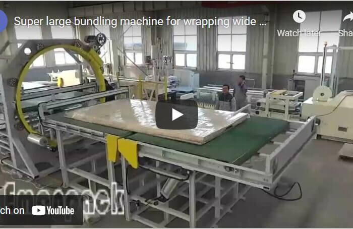 Super large bundling machine for wrapping wide panels and doors
