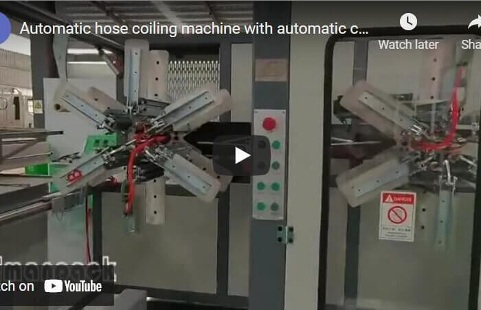 Automatic hose coiling machine with automatic coil strapping machine integration